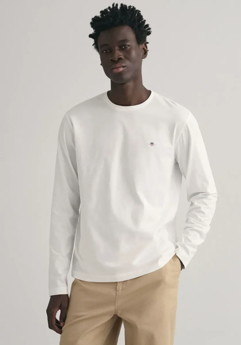 Рубашка Gant с длинными рукавами "REG SHIELD LS T-SHIRT", с вышитым логотипом на груди, цвет Eggshell
Рубашка Gant с длинными рукавами "REG SHIELD LS T-SHIRT", с вышитым логотипом на груди, цвет Eggshell