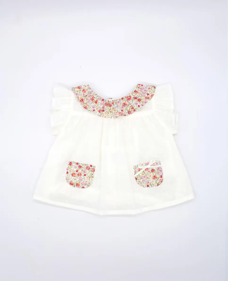 Хлопковая блузка для малышей с цветочными аппликациями Fina Ejerique, цвет Crudo
Хлопковая блузка для малышей с цветочными аппликациями Fina Ejerique, цвет Crudo