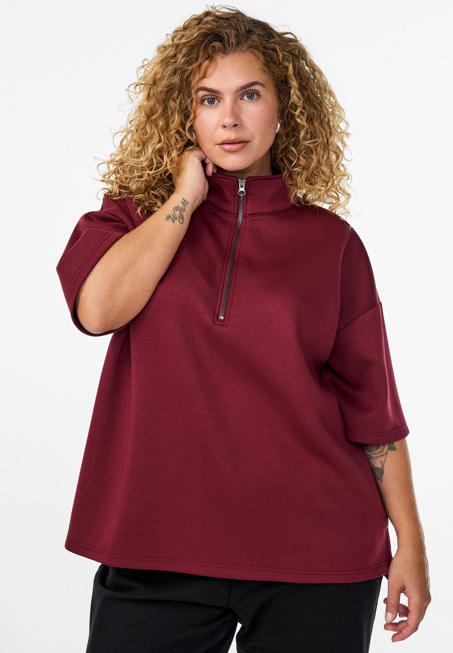 Футболка Zizzi KURZÄRMELIGES MIT HOHEM KRAGEN, Tawny Port/Bordeaux
Футболка Zizzi KURZÄRMELIGES MIT HOHEM KRAGEN, Tawny Port/Bordeaux