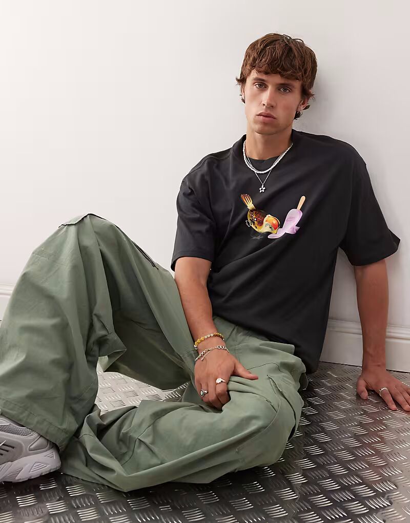 Футболка с графикой Nike SB черного цвета
Футболка с графикой Nike SB черного цвета