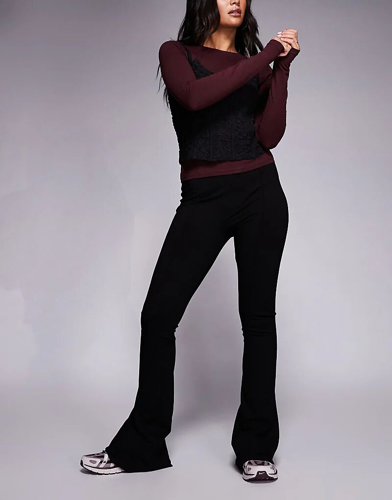 Расклешенные брюки ASOS DESIGN с защипами черного цвета
Расклешенные брюки ASOS DESIGN с защипами черного цвета