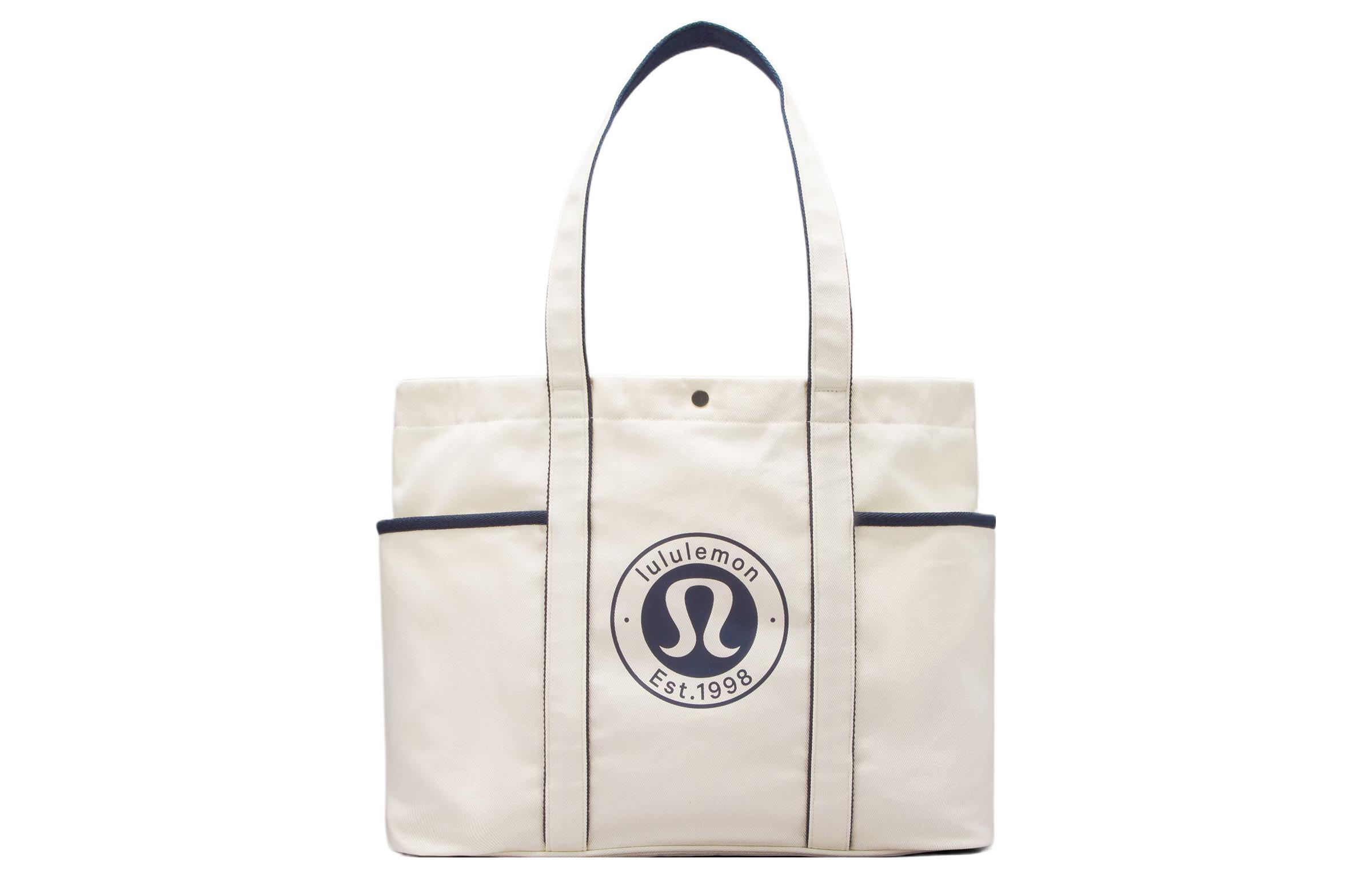 Lululemon Хлопковая холщовая сумка-шоппер унисекс натурального и морского синего цветов, Natural & True Marine Blue
Lululemon Хлопковая холщовая сумка-шоппер унисекс натурального и морского синего цветов, Natural & True Marine Blue