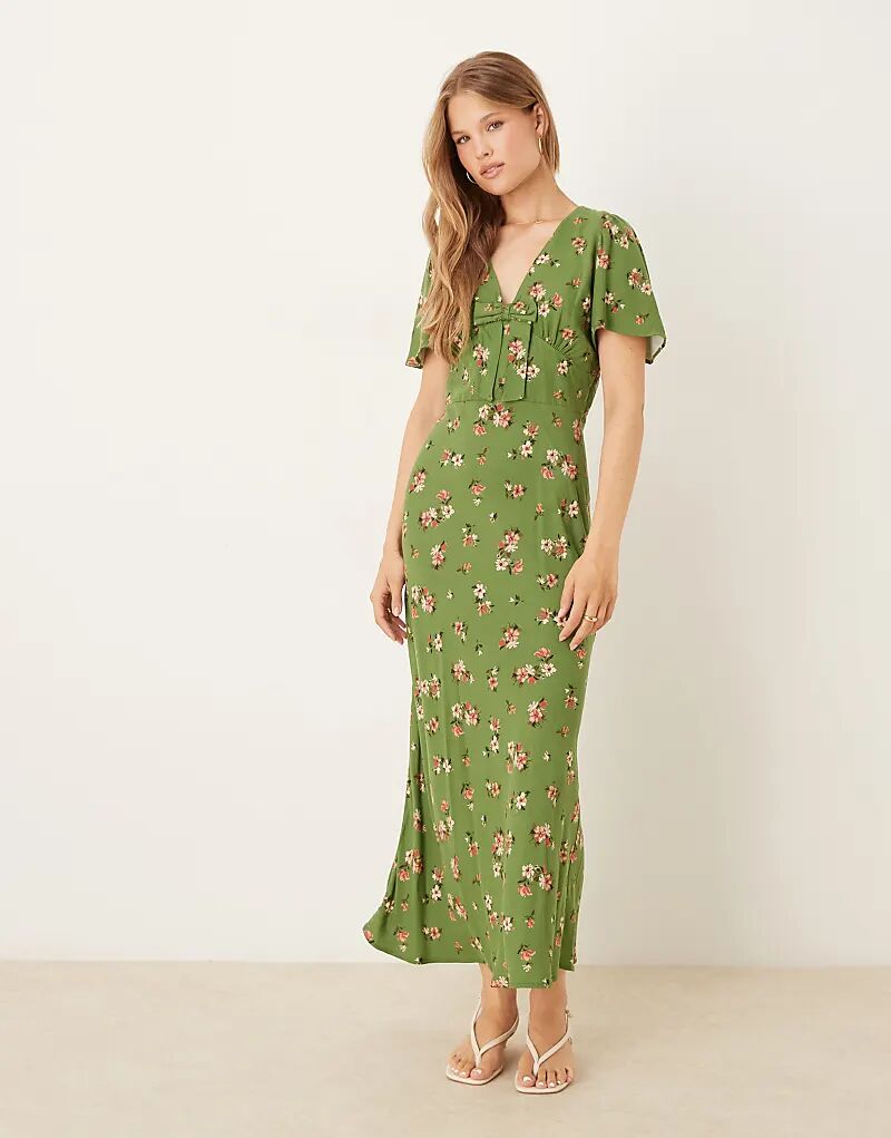 Платье миди с бантом спереди от Nobody's Child Faith с зелеными цветочными узорами
Платье миди с бантом спереди от Nobody's Child Faith с зелеными цветочными узорами