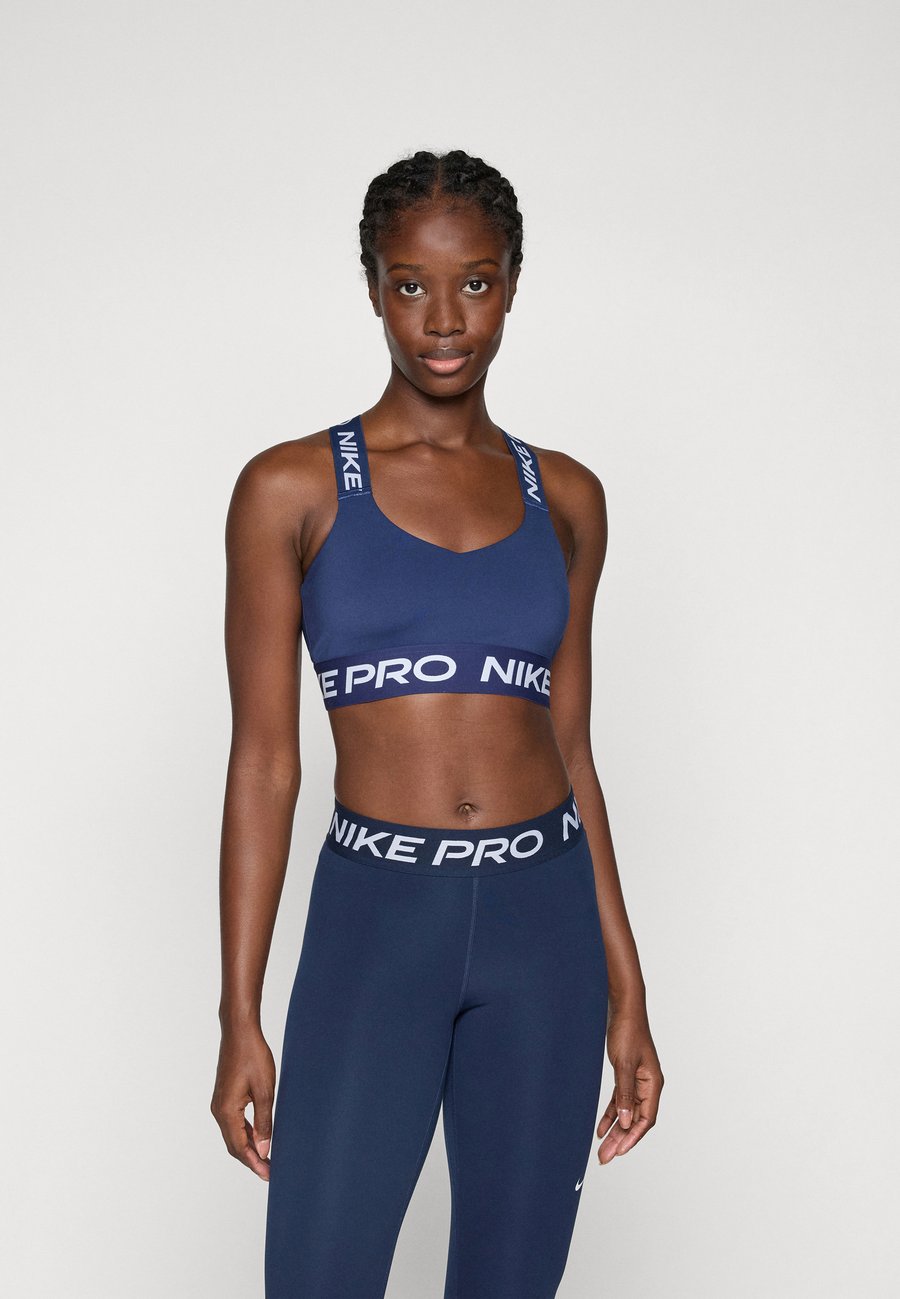 Бюстгальтер Nike Performance BRA, Midnight Navy/White/Dark Blue
Бюстгальтер Nike Performance BRA, Midnight Navy/White/Dark Blue