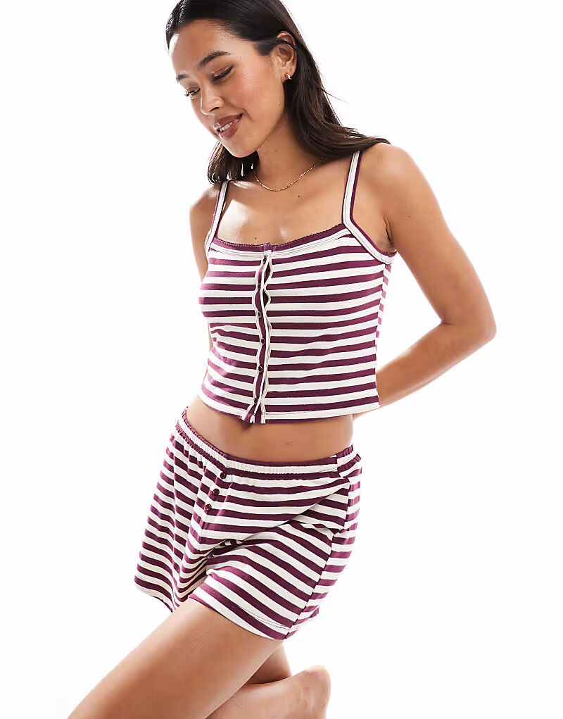 Майка из джерси персикового цвета с застежкой на пуговицы в полоску цвета темного дуба Cotton On
Майка из джерси персикового цвета с застежкой на пуговицы в полоску цвета темного дуба Cotton On