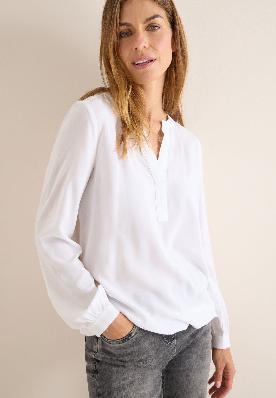 Блуза Cecil SPLIT NECK, Weiß/White
Блуза Cecil SPLIT NECK, Weiß/White