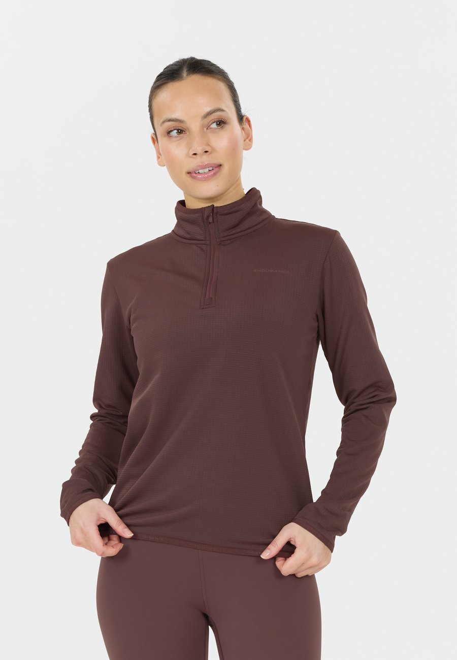 Топ Endurance VIRONIC WAFFLE MIDLAYER, 4261 Huckleberry/Purple
Топ Endurance VIRONIC WAFFLE MIDLAYER, 4261 Huckleberry/Purple