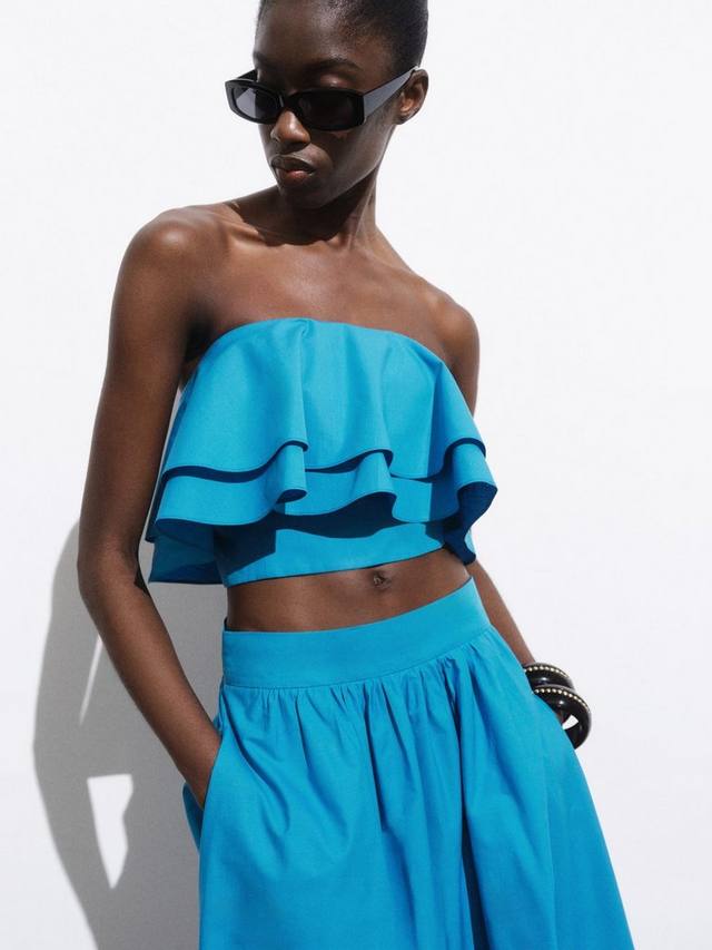 Хлопковый топ Daiquiri без бретелей с бандо и кропом Mango
Хлопковый топ Daiquiri без бретелей с бандо и кропом Mango