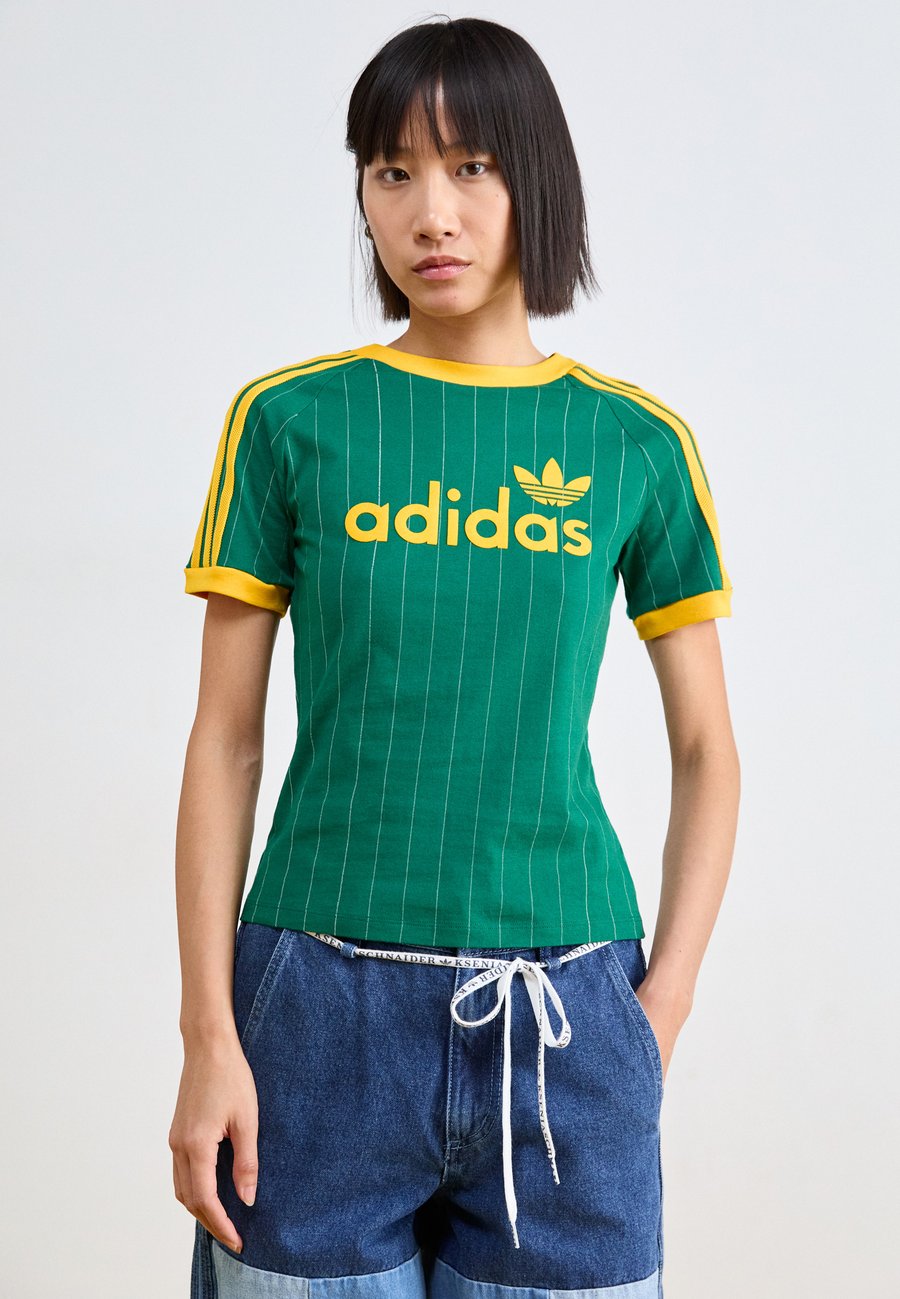 Спортивная футболка Adidas Originals LINEAR GRAPHIC CALIFORNIA, Collegiate Green/Off White/Green
Спортивная футболка Adidas Originals LINEAR GRAPHIC CALIFORNIA, Collegiate Green/Off White/Green