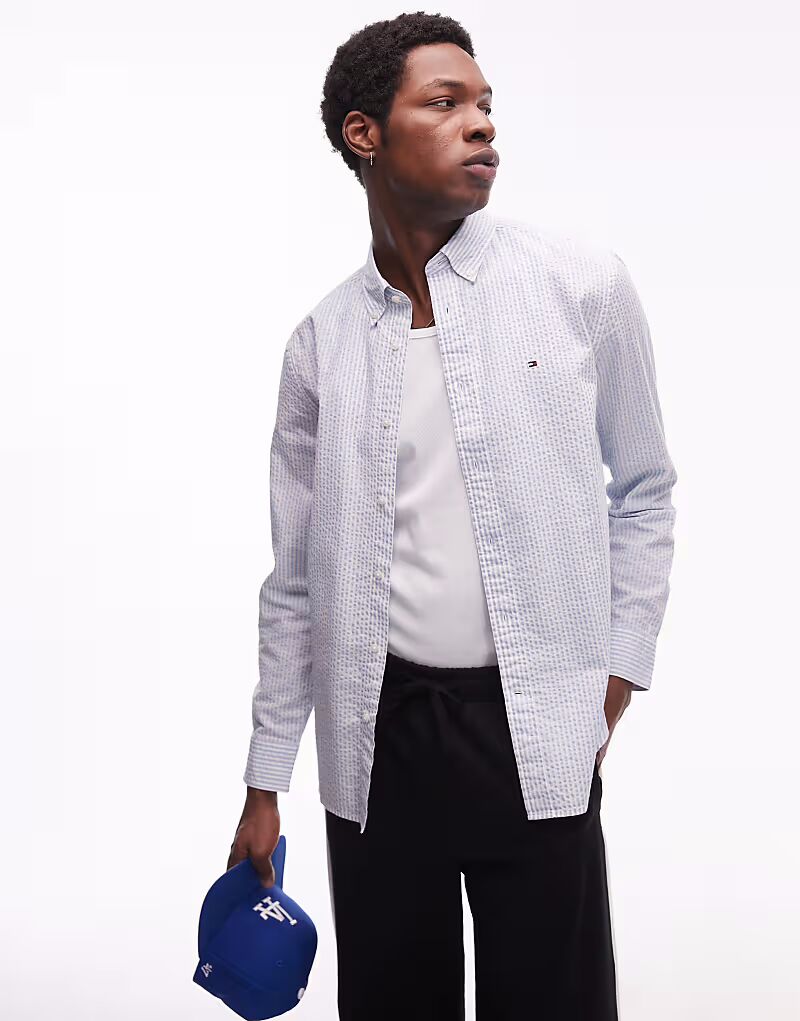 Рубашка Tommy Hilfiger из сирсакера в бледно-голубую полоску
Рубашка Tommy Hilfiger из сирсакера в бледно-голубую полоску