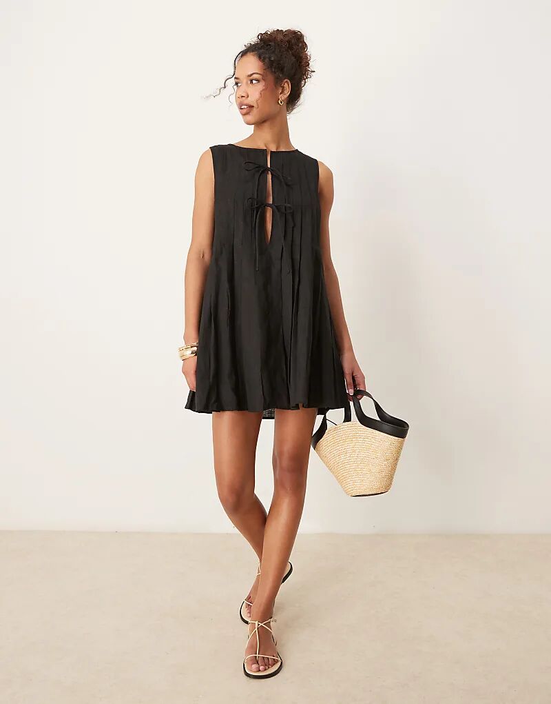 Мини-платье из льна VRG GRL Valeria с завязкой спереди, черное
Мини-платье из льна VRG GRL Valeria с завязкой спереди, черное