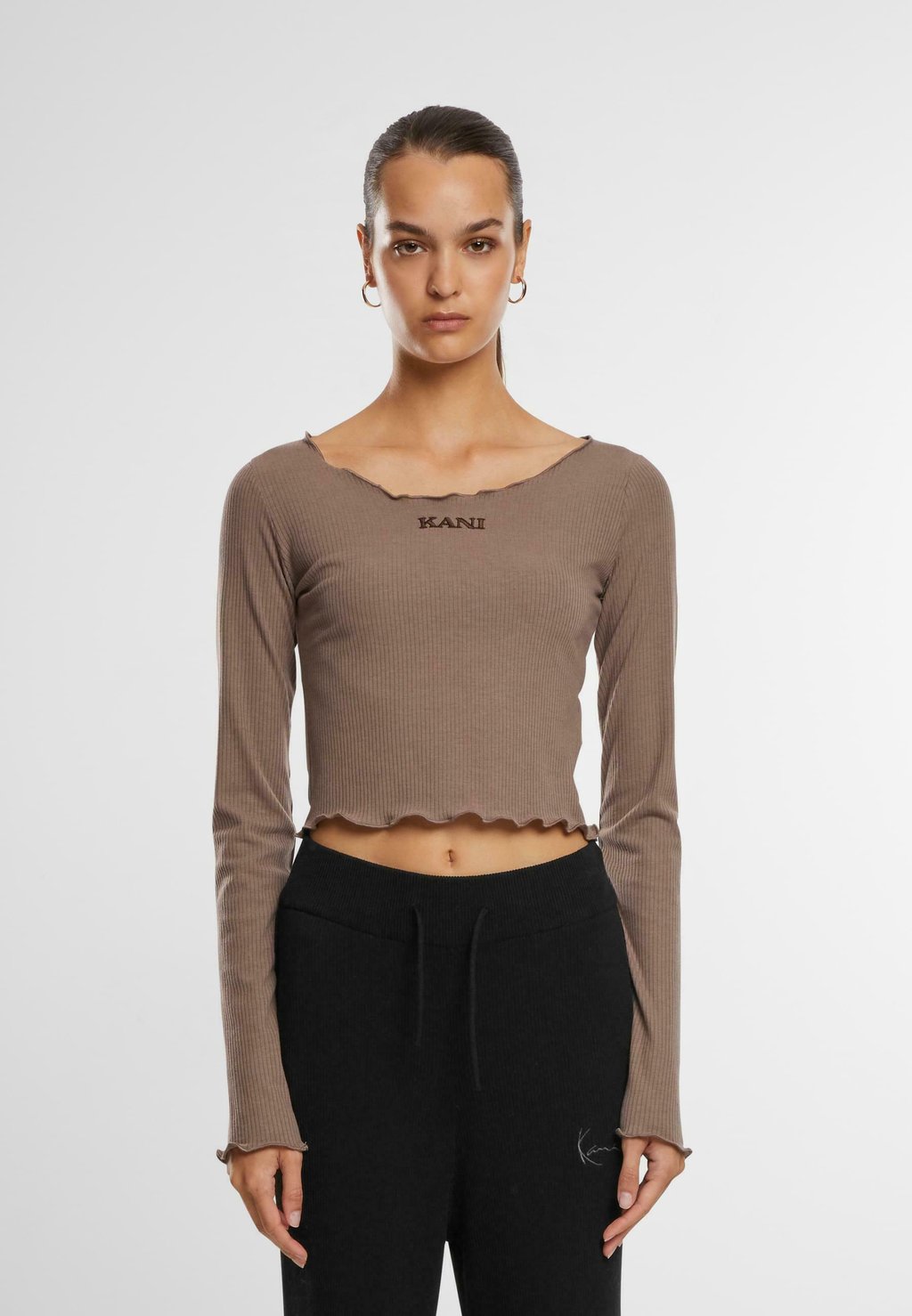 Джемпер Karl Kani, серо-коричневый
Джемпер Karl Kani, серо-коричневый