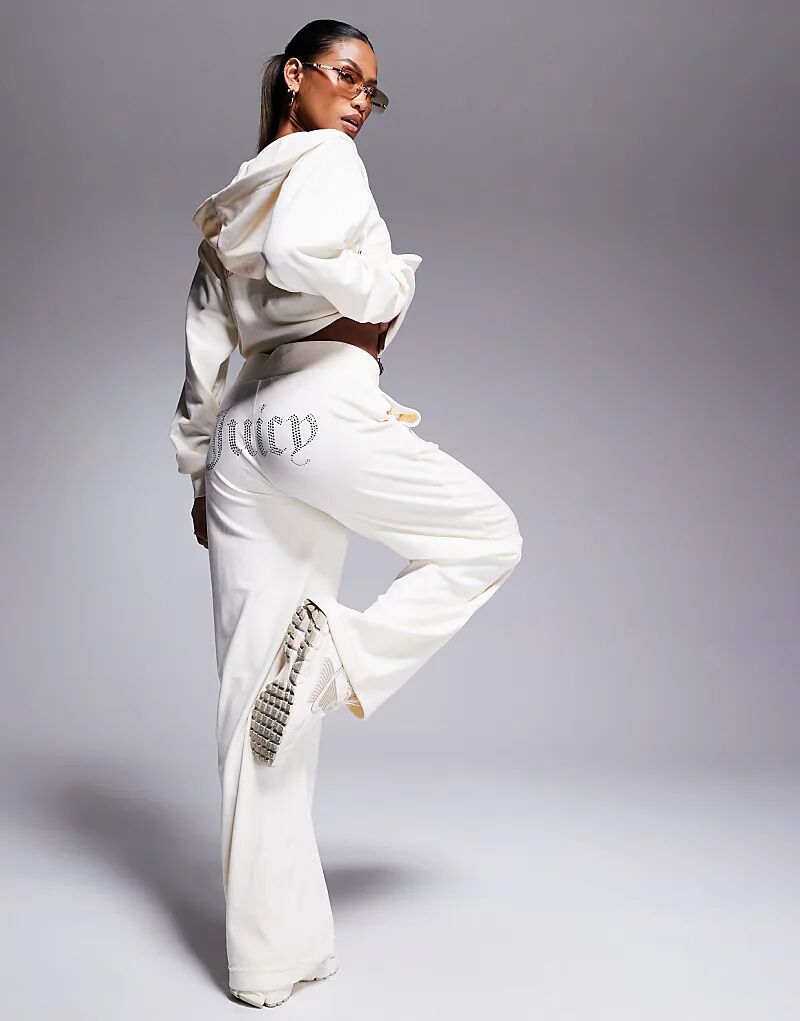 Велюровые широкие брюки белого цвета Juicy Couture
Велюровые широкие брюки белого цвета Juicy Couture