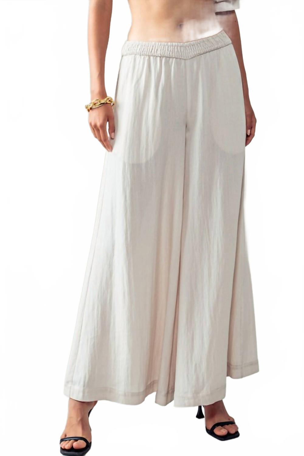 Потоковые широкие брюки с драпировкой в пыльном бежевом Urban Daizy
Потоковые широкие брюки с драпировкой в пыльном бежевом Urban Daizy