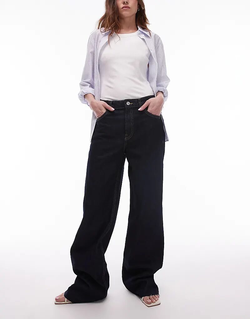 Расклешенные удлиненные джинсы цвета индиго Mango
Расклешенные удлиненные джинсы цвета индиго Mango