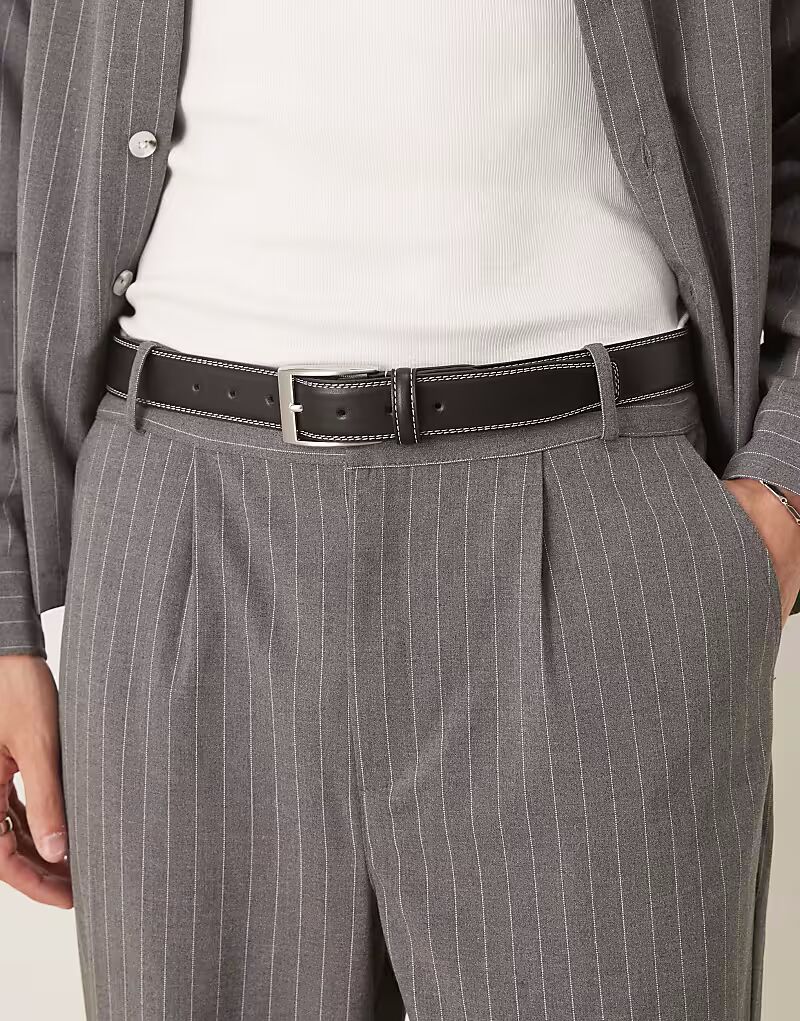 Элегантный ремень ASOS DESIGN с контрастной строчкой из черной искусственной кожи
Элегантный ремень ASOS DESIGN с контрастной строчкой из черной искусственной кожи