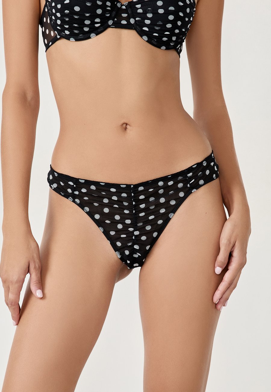 Трусы Etam SYMBIOSE, Black Printed/Black
Трусы Etam SYMBIOSE, Black Printed/Black