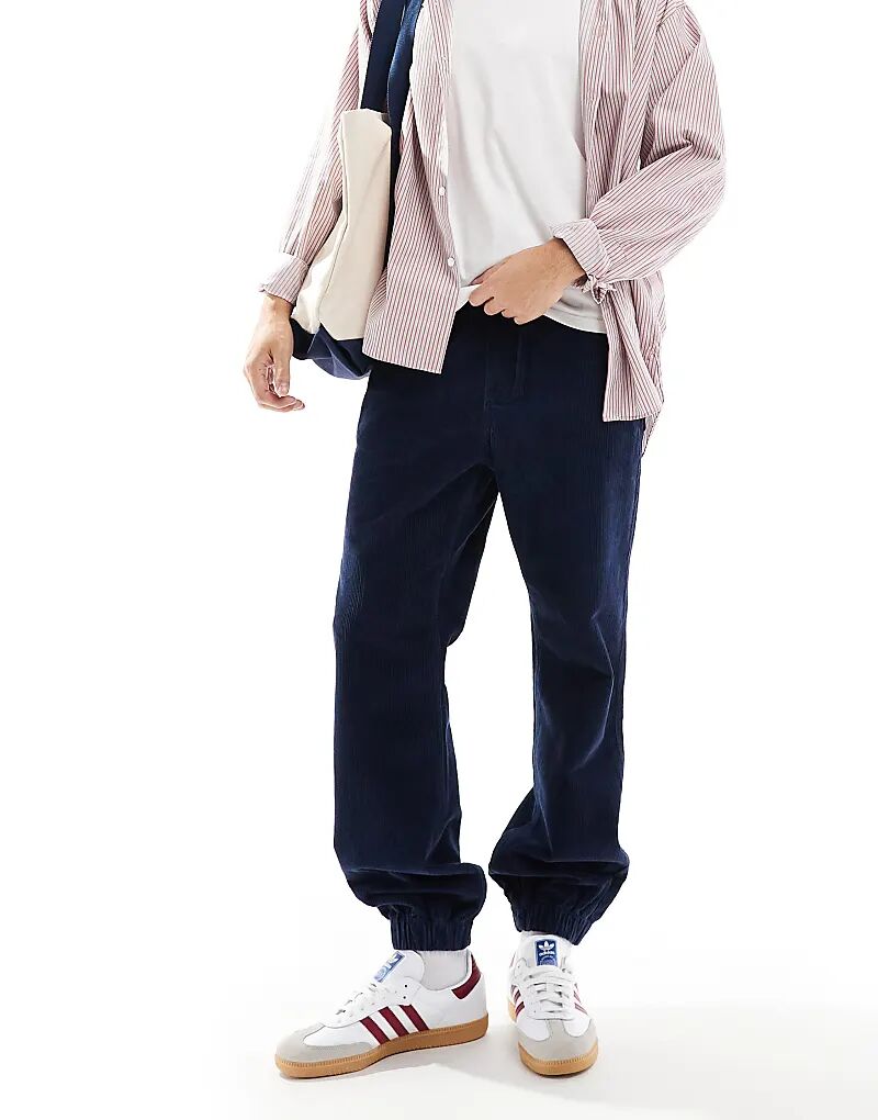 Зауженные книзу вельветовые брюки-джоггеры темно-синего цвета ASOS DESIGN
Зауженные книзу вельветовые брюки-джоггеры темно-синего цвета ASOS DESIGN