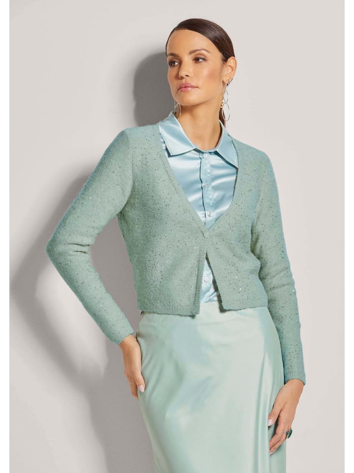 MADELEINE Короткий кардиган с блестками светло-зеленого/серебристого цвета
MADELEINE Короткий кардиган с блестками светло-зеленого/серебристого цвета