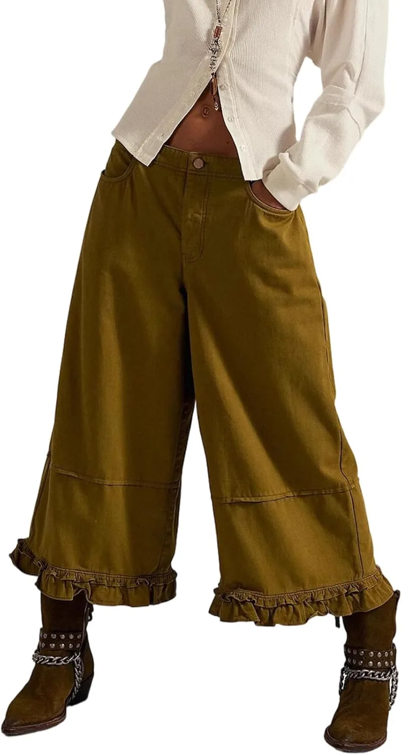 Женские джинсы с широкими штанинами, эластичным поясом и оборкой по низу
Женские джинсы с широкими штанинами, эластичным поясом и оборкой по низу