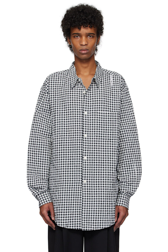 Рубашка с длинным рукавом из черно-белой ткани в клетку Marni
Рубашка с длинным рукавом из черно-белой ткани в клетку Marni