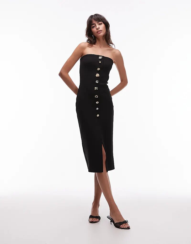 Платье-бандо миди Mango плотного трикотажа с выразительными пуговицами черного цвета
Платье-бандо миди Mango плотного трикотажа с выразительными пуговицами черного цвета