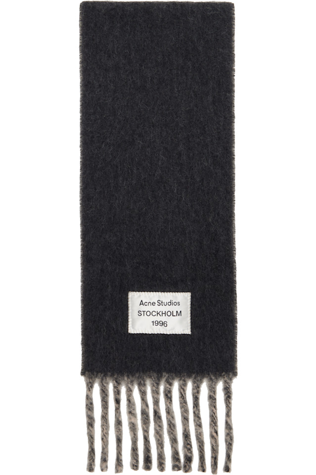 Acne Studios Двухцветный шарф из альпаки серого и бежевого цвета
Acne Studios Двухцветный шарф из альпаки серого и бежевого цвета