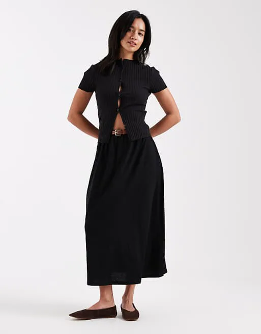 Черная трикотажная юбка макси с поясом Vero Moda Petite
Черная трикотажная юбка макси с поясом Vero Moda Petite