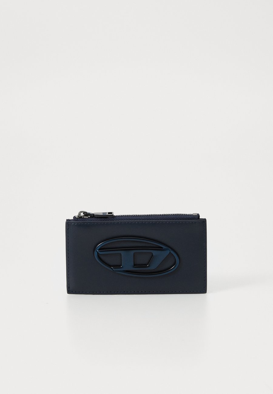 Кошелек Diesel HOLI CARD HOLDER , T6052/Blue
Кошелек Diesel HOLI CARD HOLDER , T6052/Blue