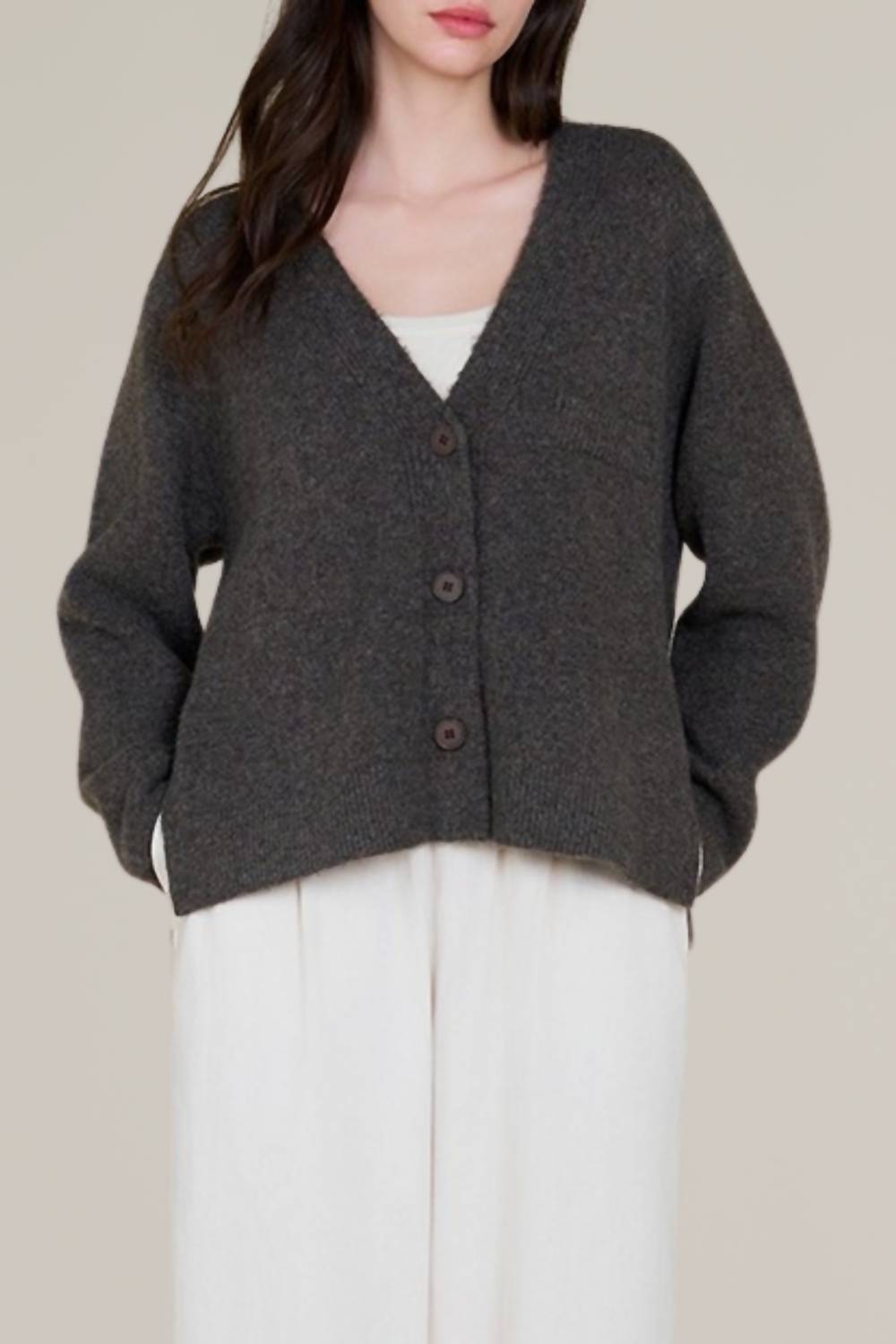 Свитер с боковыми разрезами и пуговицами черного цвета GRADE & GATHER
Свитер с боковыми разрезами и пуговицами черного цвета GRADE & GATHER