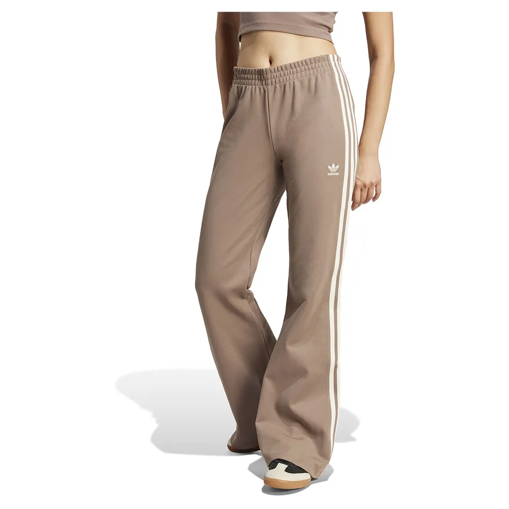 Спортивные брюки adidas Originals Adicolor 3 Stripes Flared, коричневый
Спортивные брюки adidas Originals Adicolor 3 Stripes Flared, коричневый