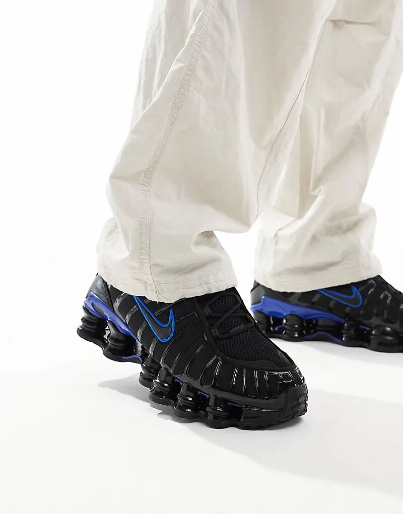 Кроссовки унисекс Nike Shox TL черного и синего цветов
Кроссовки унисекс Nike Shox TL черного и синего цветов