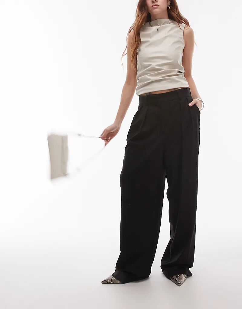 Брюки удлиненной формы черного цвета Mango
Брюки удлиненной формы черного цвета Mango