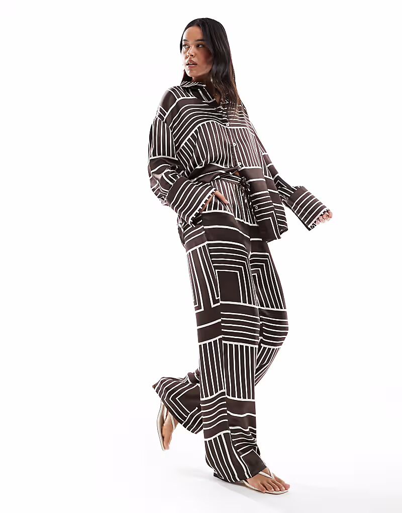 Широкие брюки из атласа с коричневым плиточным принтом 4Th & Reckless
Широкие брюки из атласа с коричневым плиточным принтом 4Th & Reckless