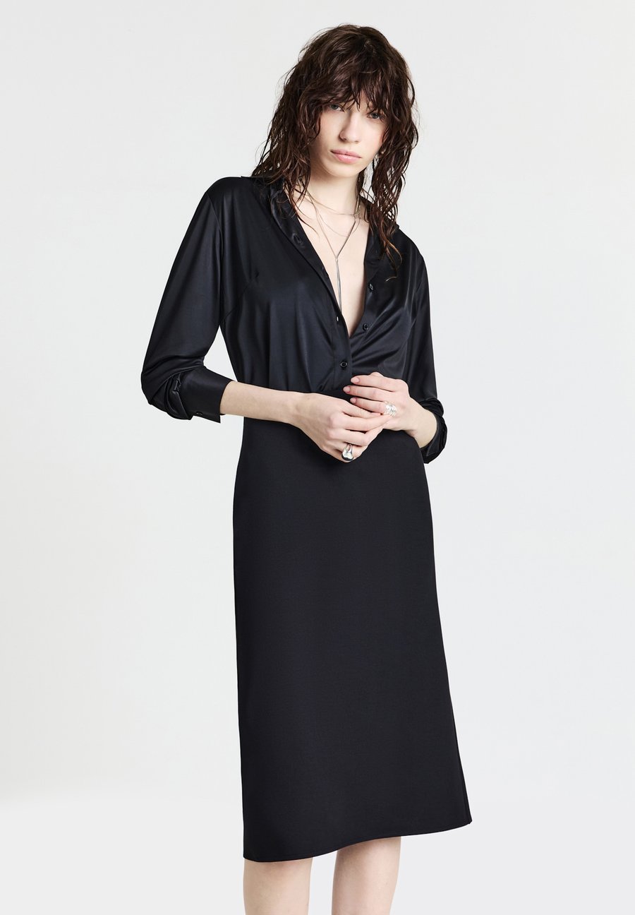 Блуза Calliope UNITA, Ultrablack/Black
Блуза Calliope UNITA, Ultrablack/Black