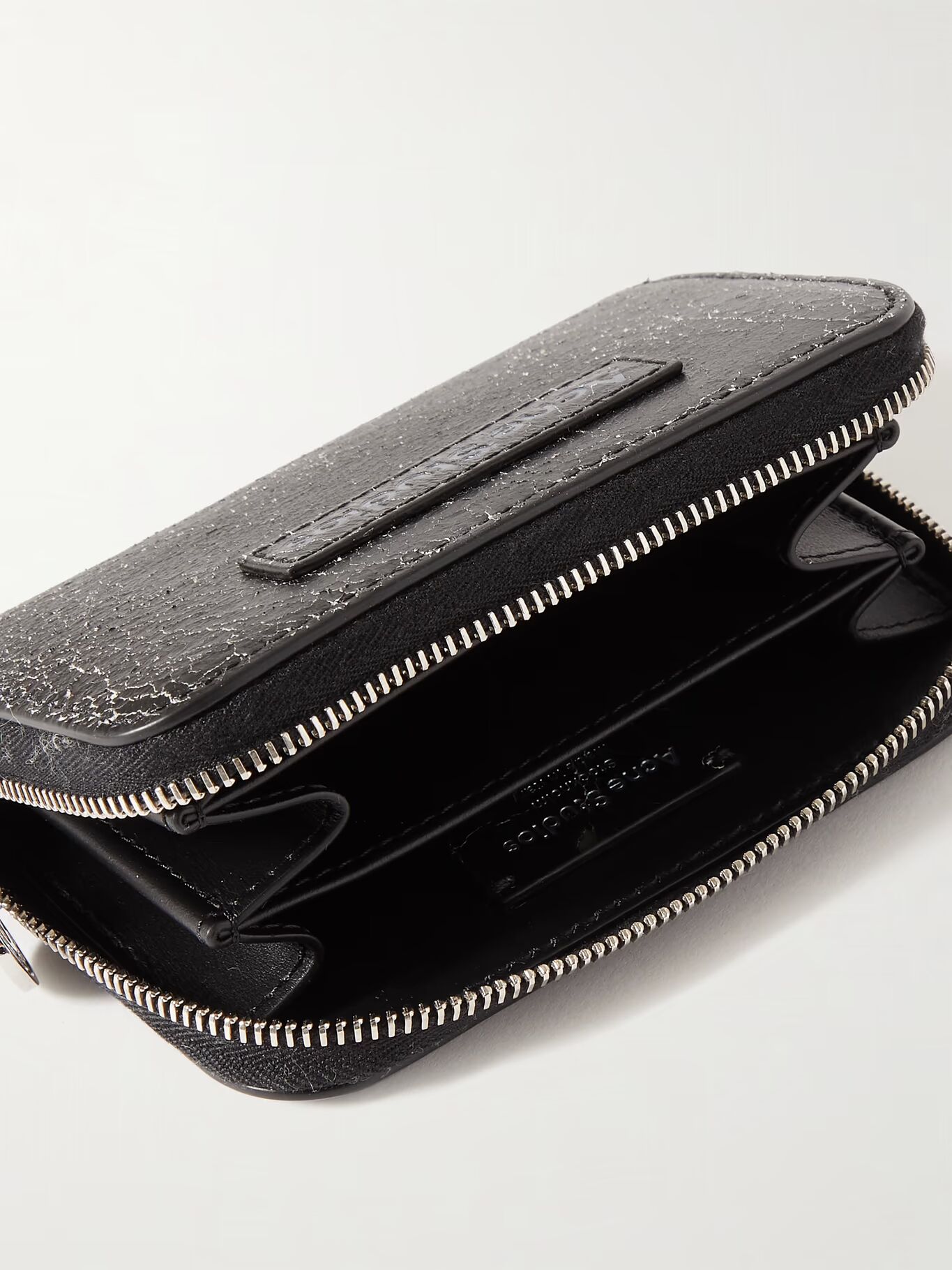 Кошелек из потрескавшейся кожи с застежкой-молнией ACNE STUDIOS, черный
Кошелек из потрескавшейся кожи с застежкой-молнией ACNE STUDIOS, черный