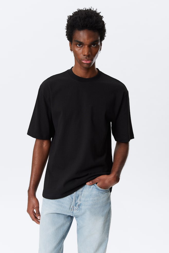 Свободная хлопковая футболка Weekday, черный
Свободная хлопковая футболка Weekday, черный