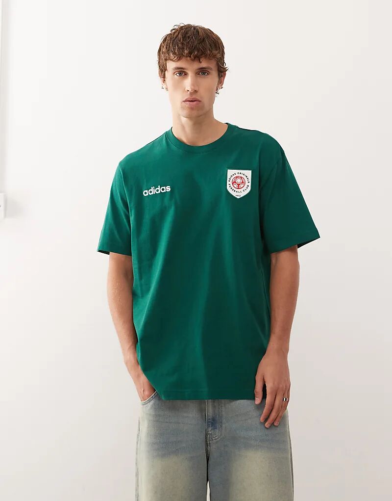 Футболка с графическим значком adidas Originals в студенческом зеленом цвете
Футболка с графическим значком adidas Originals в студенческом зеленом цвете