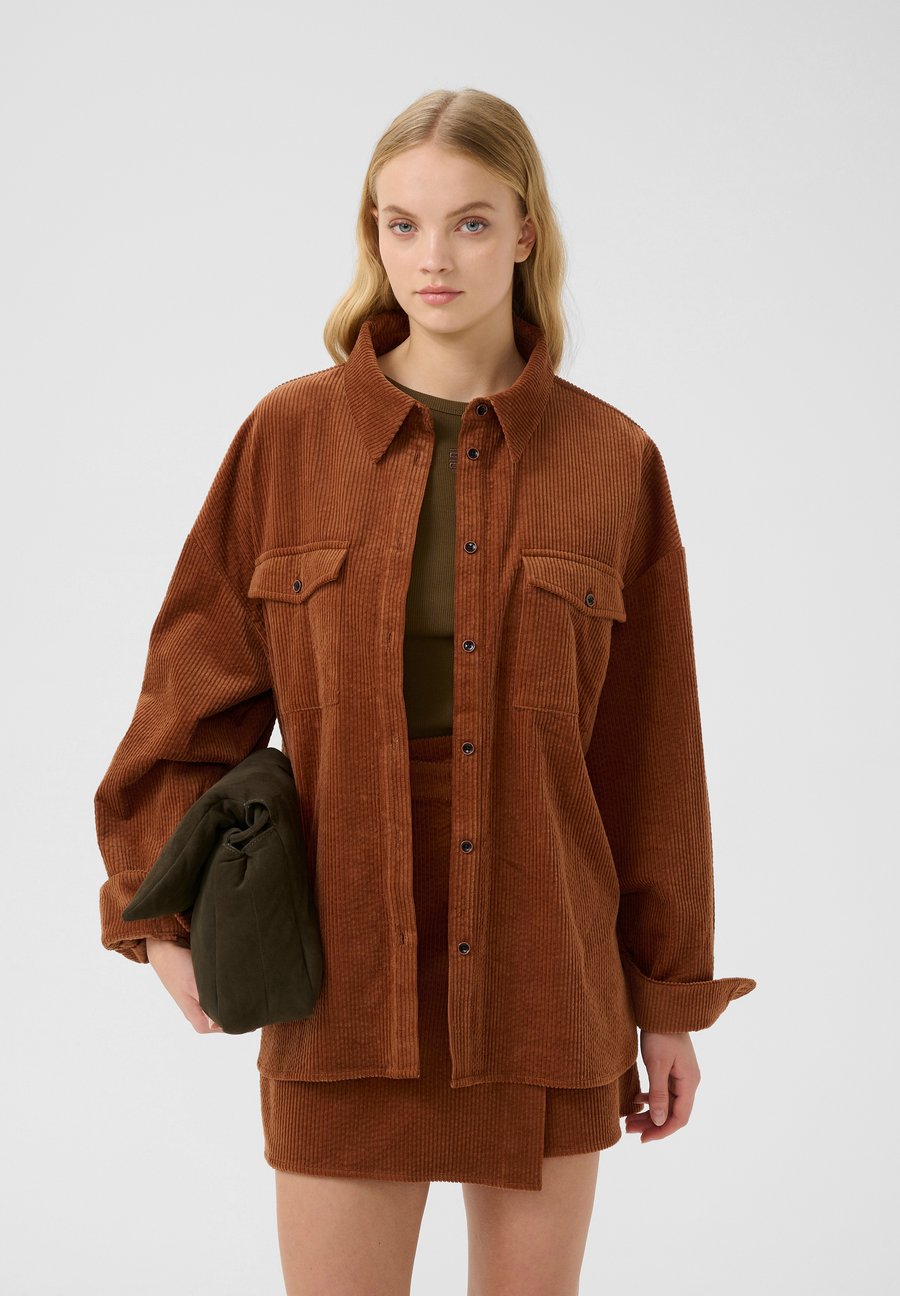 Блуза Gestuz Button-down blouse, Cambridge Brown/Dark Brown
Блуза Gestuz Button-down blouse, Cambridge Brown/Dark Brown