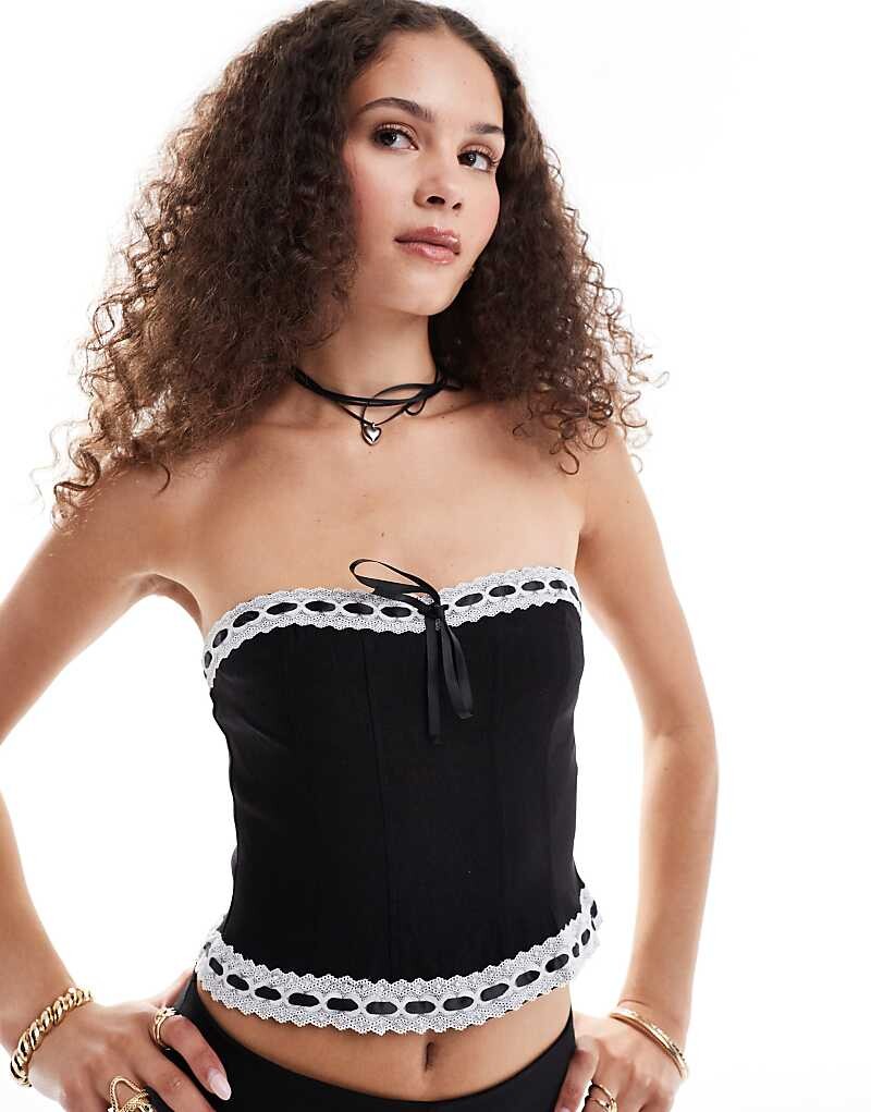 Черный корсетный топ с кружевными краями Motel karida
Черный корсетный топ с кружевными краями Motel karida