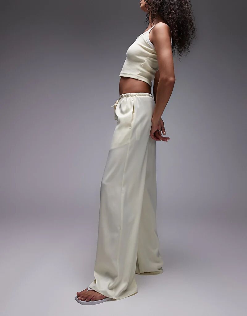 Широкие брюки Topshop с атласным поясом и завязкой, цвета пахты 
Широкие брюки Topshop с атласным поясом и завязкой, цвета пахты