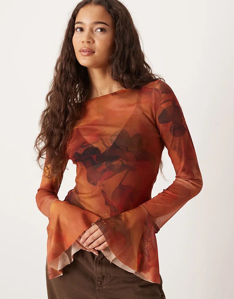 Топ из прозрачной сетки ASOS DESIGN с расклешенными рукавами и ржавым цветочным принтом
Топ из прозрачной сетки ASOS DESIGN с расклешенными рукавами и ржавым цветочным принтом