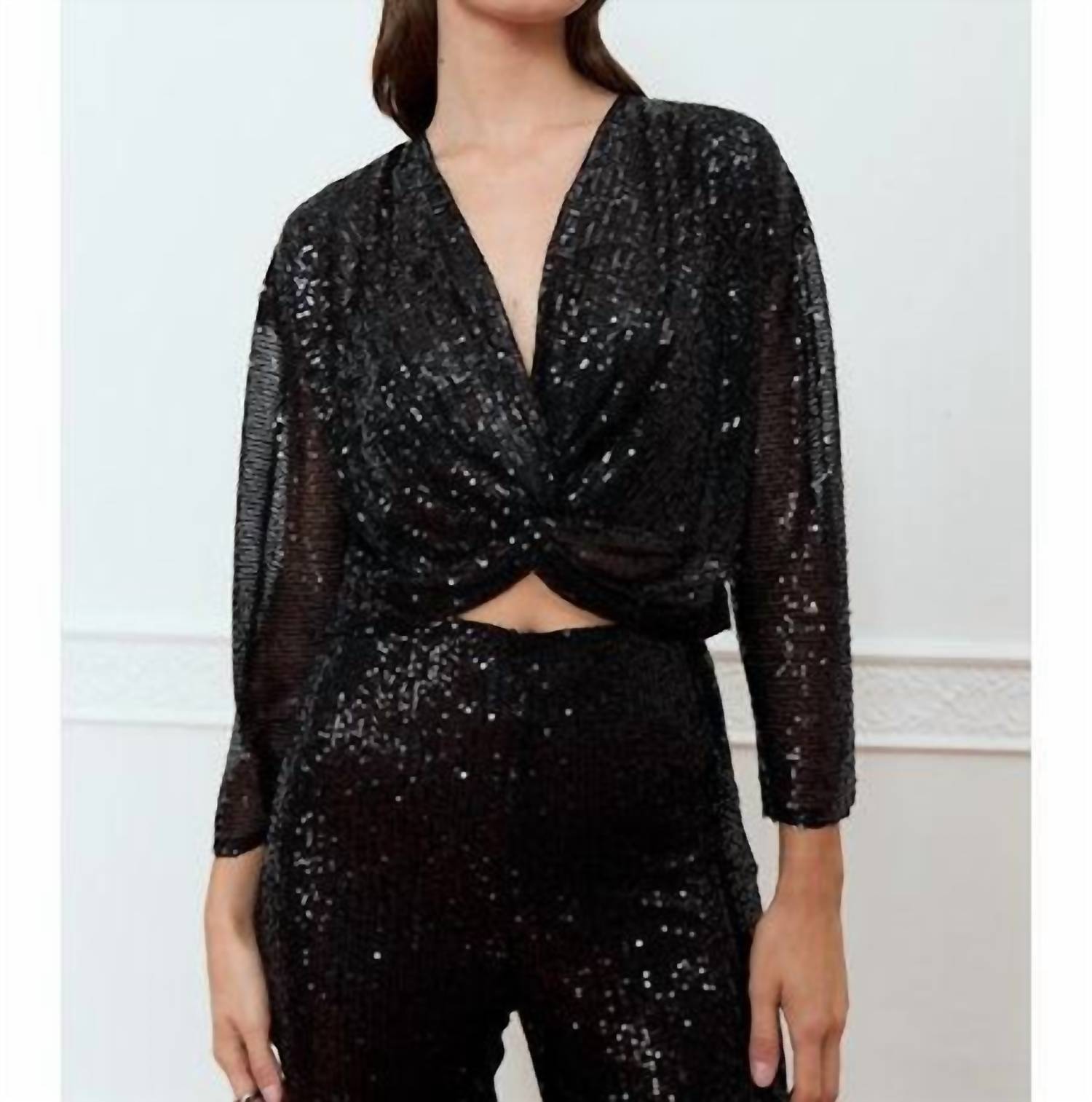 Топ с пайетками Amapola черного цвета DELUC
Топ с пайетками Amapola черного цвета DELUC