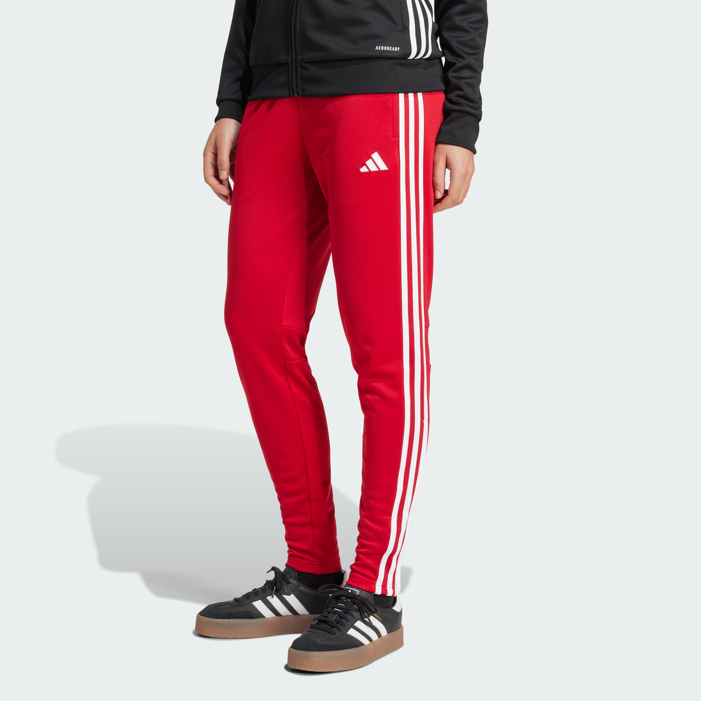Женские тренировочные брюки Adidas Tiro 25 Essentials, красно-белый
Женские тренировочные брюки Adidas Tiro 25 Essentials, красно-белый