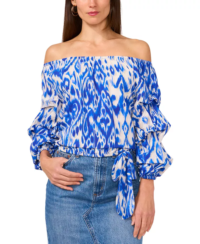 Женская блуза с принтом в стиле икат, с открытыми плечами, пузырчатыми рукавами 3/4 длины и завязками спереди Vince Camuto, синий
Женская блуза с принтом в стиле икат, с открытыми плечами, пузырчатыми рукавами 3/4 длины и завязками спереди Vince Camuto, синий