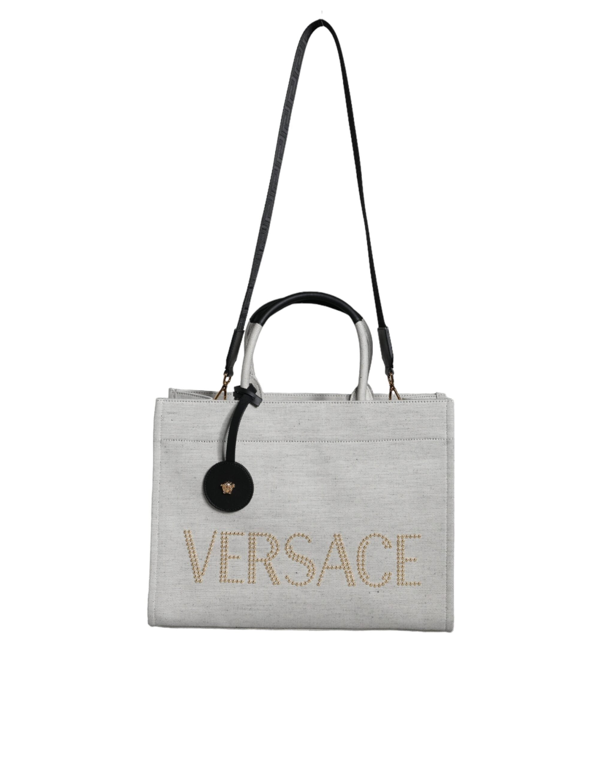 Женская сумка через плечо Versace с ручкой сверху и кожаным логотипом, черный/белый
Женская сумка через плечо Versace с ручкой сверху и кожаным логотипом, черный/белый