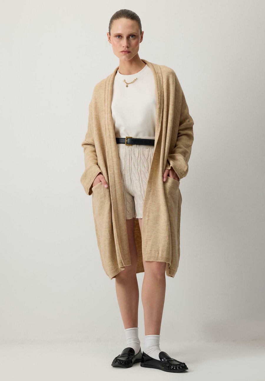 Кардиган Touché Privé OVERSIZE, Grey/Stone
Кардиган Touché Privé OVERSIZE, Grey/Stone