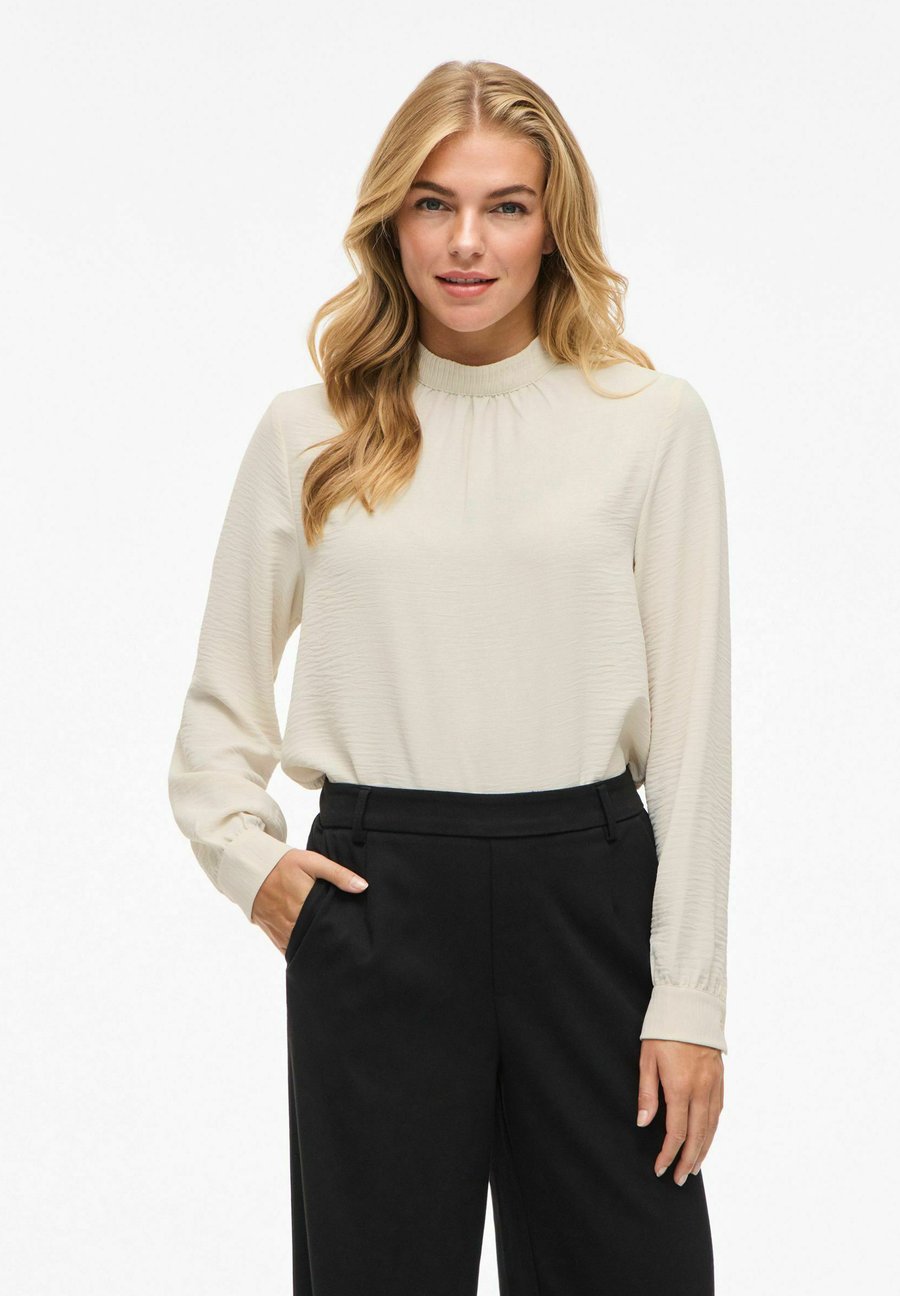 Блуза VILA VIJOSA HIGH NECK , Birch/Beige
Блуза VILA VIJOSA HIGH NECK , Birch/Beige