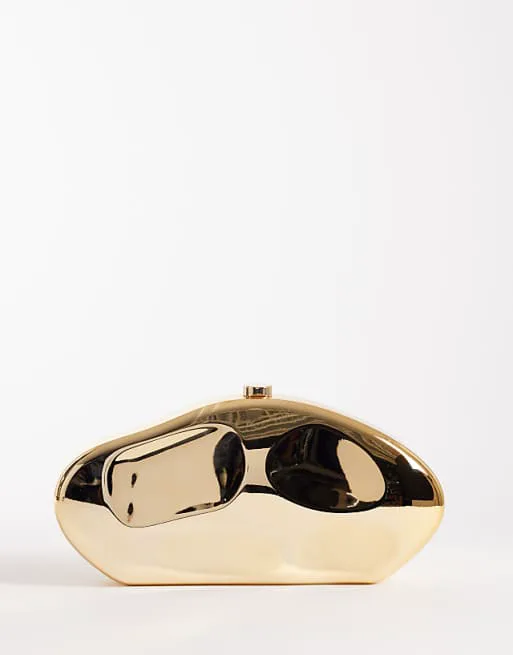 Золотой клатч из чеканного металла My Accessories
Золотой клатч из чеканного металла My Accessories