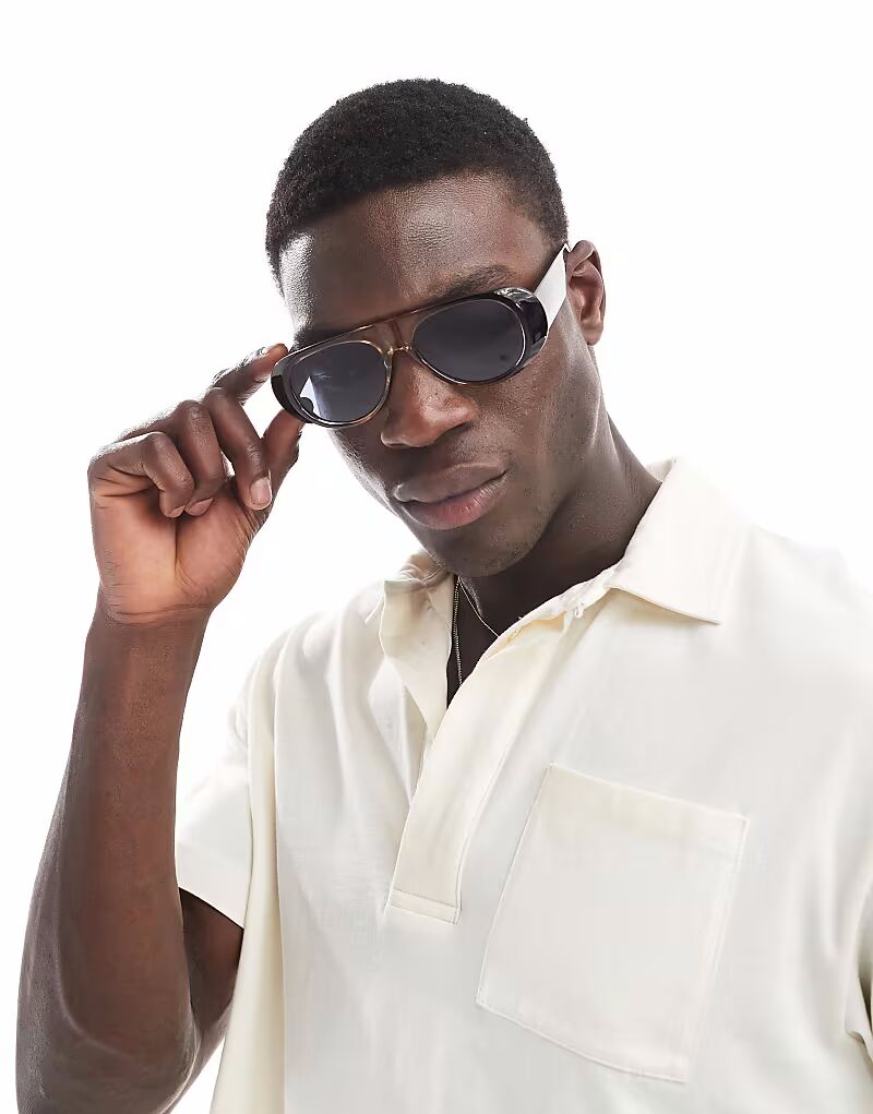 Солнцезащитные очки-авиаторы ASOS DESIGN Festival в коричневой оправе с синими линзами
Солнцезащитные очки-авиаторы ASOS DESIGN Festival в коричневой оправе с синими линзами